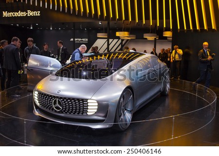 DETROIT - JANUARY 12: Members of the press look at a Mercedes concept on display January 12th, 2015 at the 2015 North American International Auto Show in Detroit, Michigan.