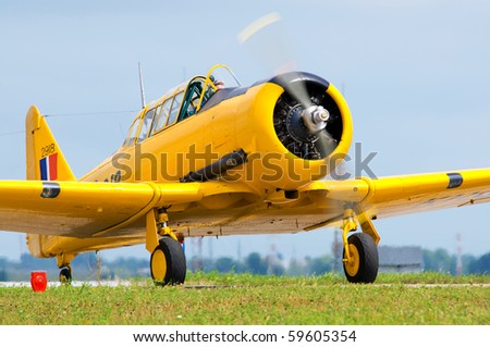 WINDSOR, ONTARIO - AUG 22: A Harvard Trainer taxis on the runway AUGUST 22, 2010 at the Windsor International Airport in Windsor, Ontario.