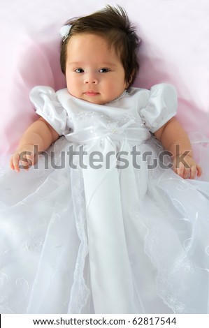 White Dresses  Babies on Photo   Newborn Baby Girl In A White Baptism Dress On A Pink Blanket