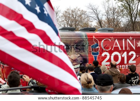YPSILANTI, MI - NOVEMBER 10th: The Herman Cain tour bus pulls into the Big Sky Diner parking lot, November 10, 2011 in Ypsilanti, MI