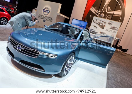 CHICAGO - FEB 8: A member of the press photographs the Volvo concept car at the 2012 Chicago Auto Show Media Preview on February 9, 2012 in Chicago, Illinois.