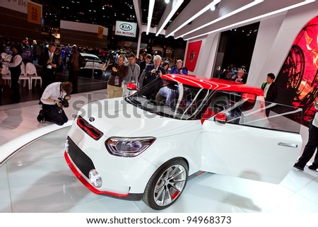 CHICAGO - FEB 8: Members of the media inspect the new Kia Trackster at the 2012 Chicago Auto Show Media Preview on February 8, 2012 in Chicago, Illinois.
