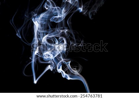 Gray smoke with light on back background