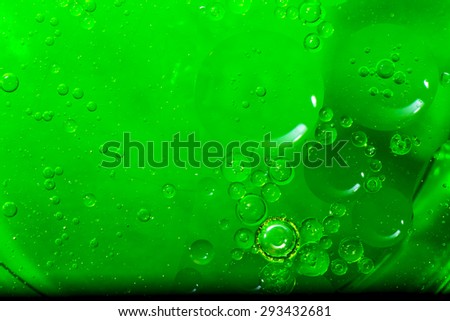 Abstract green Bubbles Of Water Floating Like A Swarm