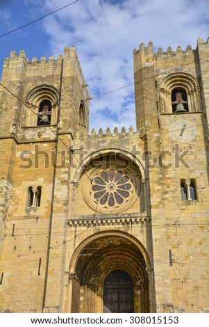 Lisbon Cathedral from the front showing arch and door