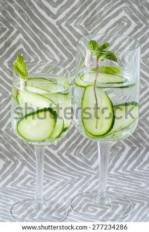 Closeup of glasses of cucumber, mint infused water