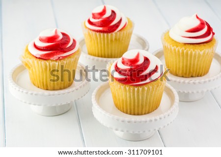 Close up of strawberry  vanilla cream  cap cakes.