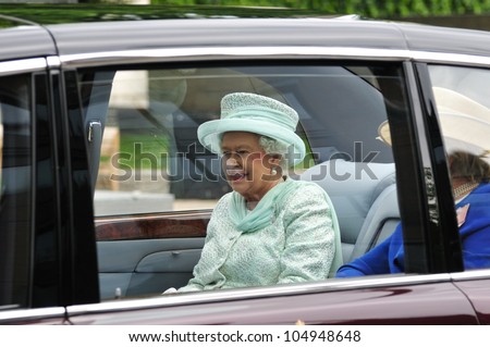 LONDON  JUNE 5 -  Britains Queen Elizabeth II drives in motorcade with The Lady Farnham, on her way to Westminster during the Queens 60TH Diamond Jubilee celebrations on June 5, 2012 in London.