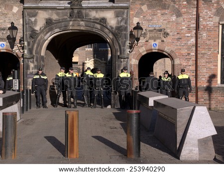 The Hague, Netherlands,february-18-2015 Police officers protecting the goverment building of holland (binnenhof) during a demonstration