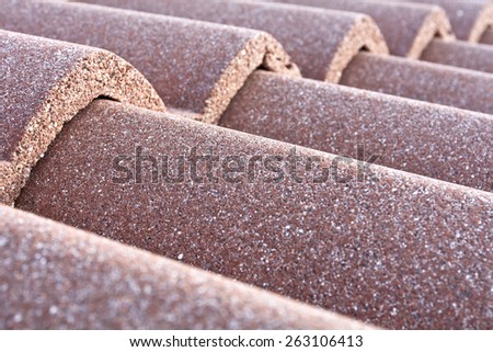 Detail of a red tile roof