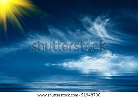 Blue sky and sun above of the sea.
