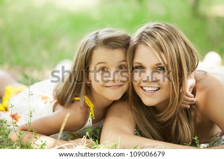 Two sisters in the park.