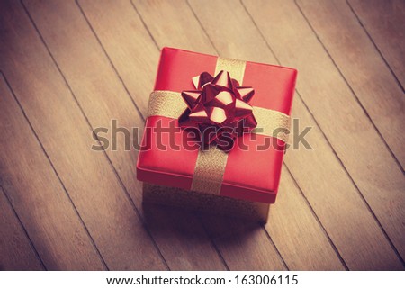 Christmas gift box on wooden table