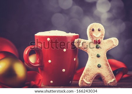 Coffee cup with cookie. Photo in retro color style.