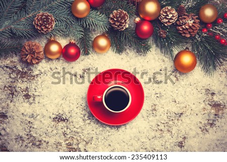 Coffee with and key on artificial snow background