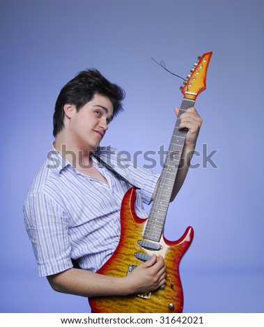 style boy with electro guitar