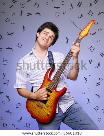 Style boy with electro guitar and abstract notes around him.