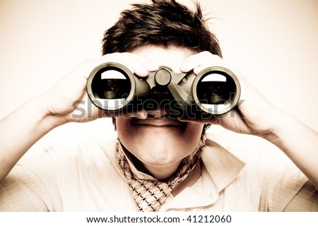 Boy with binocular. Retro style.