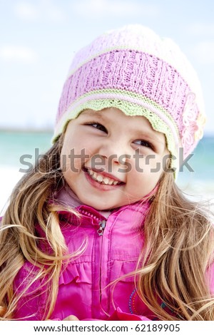 stock photo Portrait of cute young girl on the beach