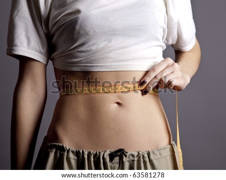 women abs pictures. women#39;s abs with metre.