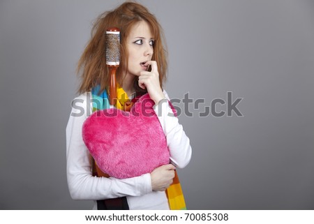 Sad girl with heart and comb. St. Valentine Day