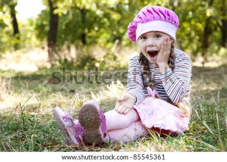Cute little girl at outdoor in fall.
