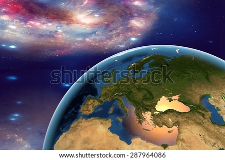 The Earth from space on the background with stars and galaxies showing Western Europe, Eastern Europe, Southern Europe on globe in the day time; elements of this image furnished by NASA