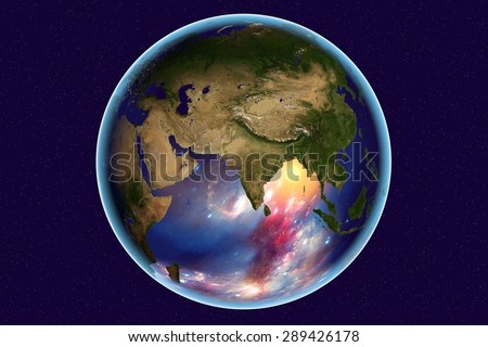 Planet Earth on background with stars; the Earth from space showing India, Arabian peninsula, Russia on globe in the day time; galaxies are reflected in water; elements of this image furnished by NASA