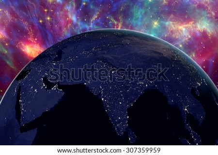 The Earth from space showing India and Arabian peninsula on surrealistic background with stars and galaxies in night, elements of this image furnished by NASA, other orientations available