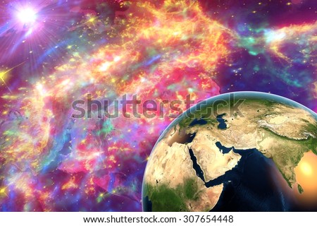 The Earth from space showing Arabian Peninsula, Arabian Sea, India in day on surrealistic background with galaxies, elements of this image furnished by NASA, other orientations available