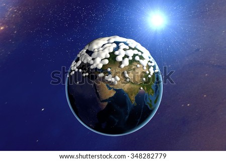 Snowing. The planet Earth from space showing India, Europe, Asia and Africa. The globe is covered with snow on space background. Fantastic background. Elements of this image furnished by NASA