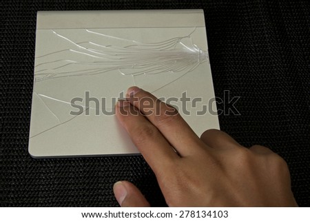 Broken track-pad touching by female finger