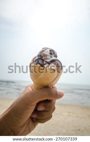 Ice cream at the beach on a hot day