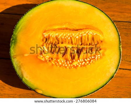Melon cut in half looking healthy and delicious
