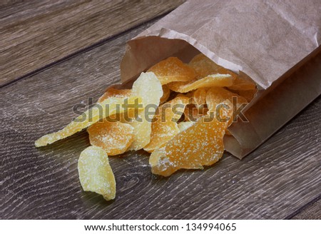 dry fruits in package on wooden table