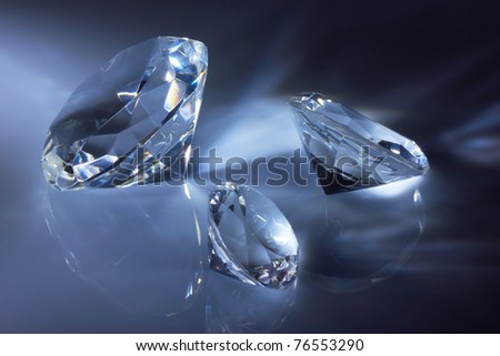 Shiny diamonds jewel on dark blue background