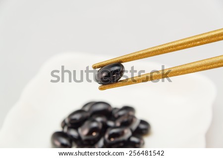 Picking up beans with the chopsticksÂ 