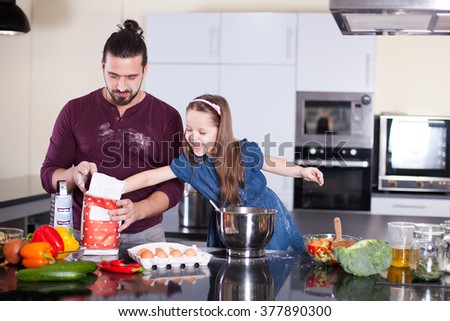 Dad and daughter preparing
