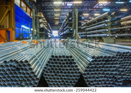 Old factory of auto components production. Warehouse of an aluminum pipes