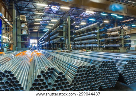 Old factory of auto components production. Warehouse of an aluminum pipes