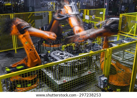 TOGLIATTI, RUSSIA - DECEMBER 05: Robots welding in a car factory. Welding car body of LADA Cars in Automobile Factory AVTOVAZ on December 05, 2013 in Togliatti