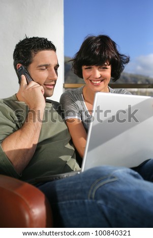 Elated couple learning happy news