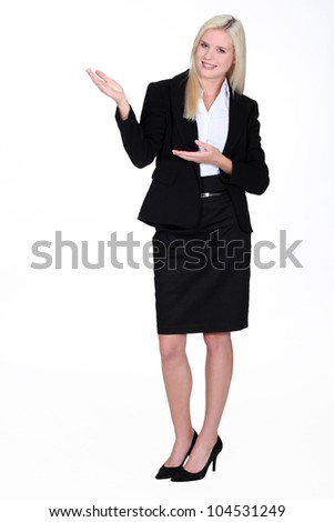 full-body portrait of gorgeous blonde businesswoman