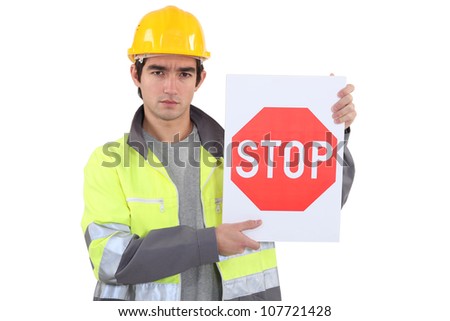 Holding Stop Sign