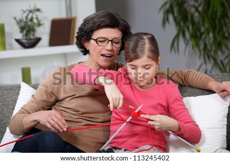 Mother and daughter knitting