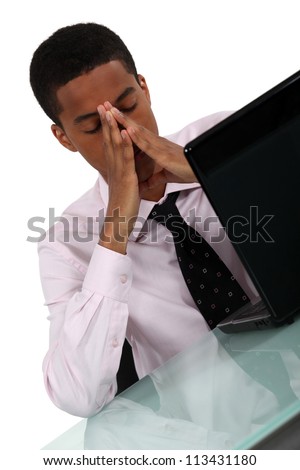 Worker resting in front of his computer