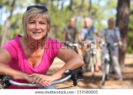 Two middle aged couple on bike ride