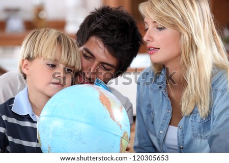 Parents teaching their son about the world