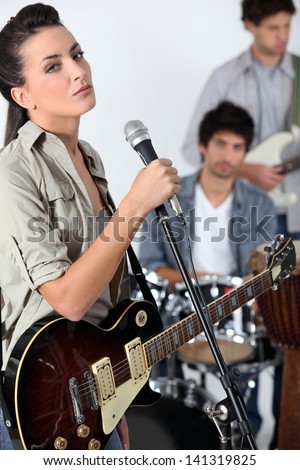 Female singer in a band