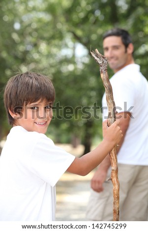 Man out for a walk with his young son